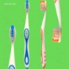 Wholesale dental toothbrush with tongue cleaner