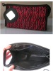 Wholesale red cosmetic bag with black waves