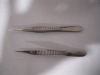 Wholesale pointed tip beauty tweezers