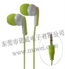green and white in-ear mp3 headphones for mp3 players