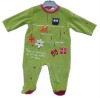 green baby clothes with emb