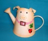 animal watering can as garden decoration