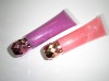 Wholesale Shimmer lip gloss in soft tube with diamond shape lid