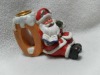 Wholesale Polyresin sitting christmas Santa Claus candle holder