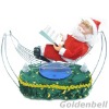 Wholesale 6'' santa claus reading and cradling