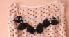 Wholesale black grosgrain dress bow with a bead