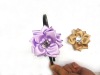 colored silk flower hair clip