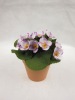 artificial violet silk flower in the pot