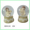 Snow globe with resin angel inside