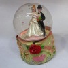 Wholesale Glass water globe with polyresin base