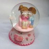Wholesale Glass water globe with polyresin base