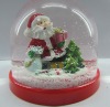 santa gift snow globes