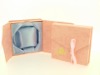 Pink jewelry box with bow tie for closure