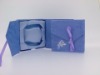 Purple jewelry box with bow tie for closure